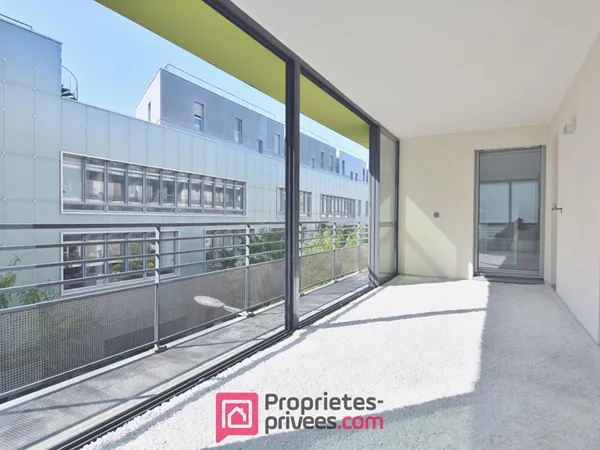 Appartement 3 pièces 66,03 m² Carrez avec 18 m² de jardin d'hiver et 8 m² de balcon filant