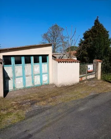 Garage avec terrain à bâtir