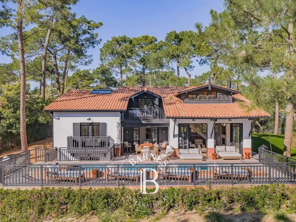 VILLA « MUSCADELLE » AVEC PISCINE ET VUE SUR LE BASSIN À LA VIGNE, SUR LA PRESQU'ÎLE DU CAP FERRET -