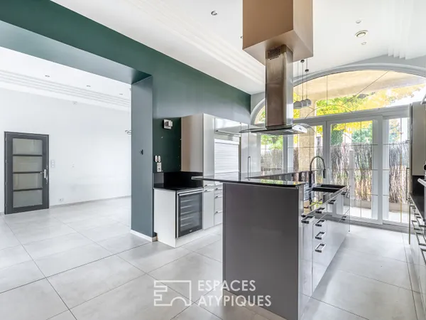Appartement en rez-de-chaussée avec terrasse, stationnement et garage