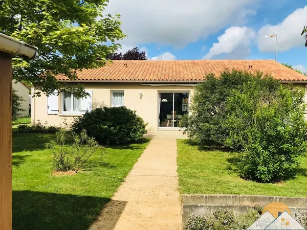 Maison sur jardin paysagé