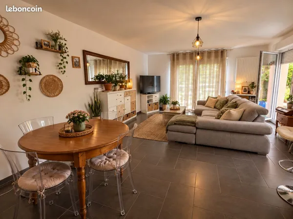 Appartement 3 pièces de 68 m2 avec jardin privatif de 96 m², garage et parking