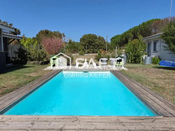 ENSEMBLE IMMOBILIER AVEC TERRAIN DE 10 700 M2