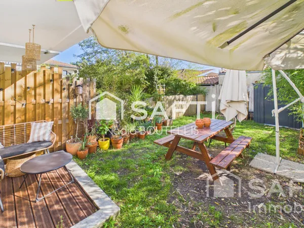 Bel appartement T2, place de parking, grand jardin