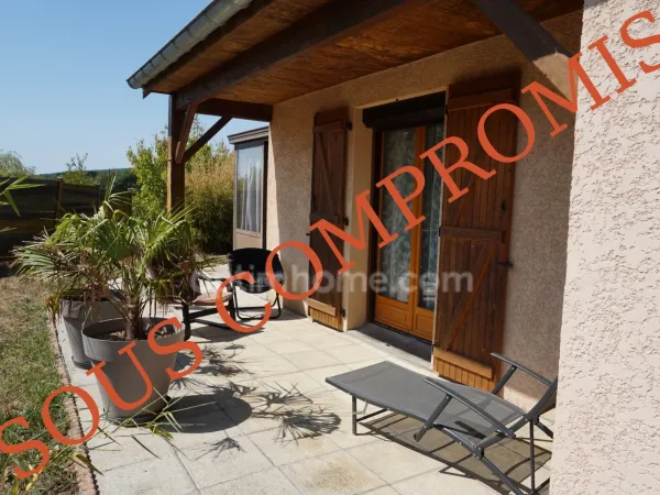 Maison à vendre avec 4 chambres, véranda et garage double à 8 km de Rioz