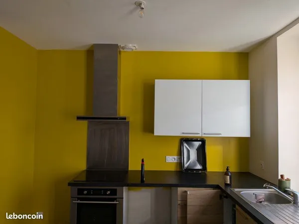Appartement bourg Irodouer en rez de jardin