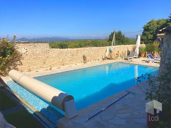 Maison 7 pièces 410 m²