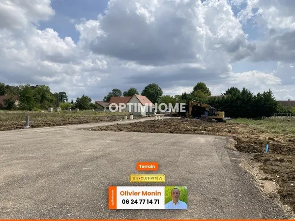 Au calme, coeur de village, terrain constructible et viabilisé de 911 m2