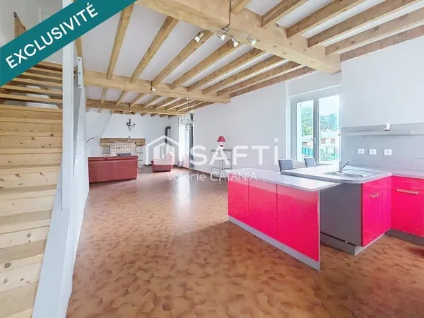 Tullins - Maison mitoyenne de 120m² habitables avec grand garage et charme de l'ancien.