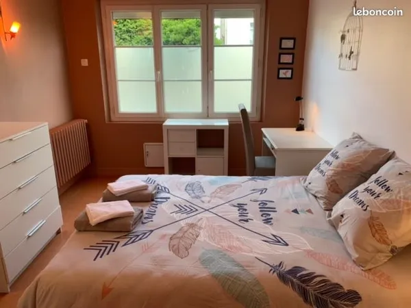 Chambre meublée chez l'habitant avec jardin et garage vélos