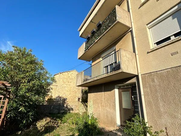 Appartement avec garage place de parking et jardin