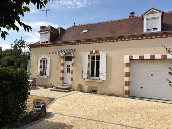 Maison de caractère alliant charme de l'ancien et confort mo