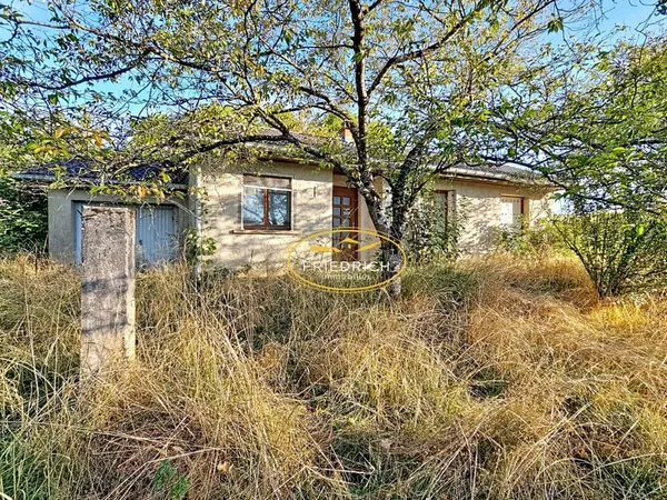 PAVILLON DE PLAIN-PIED A RÉNOVER - VUE DÉGAGÉE