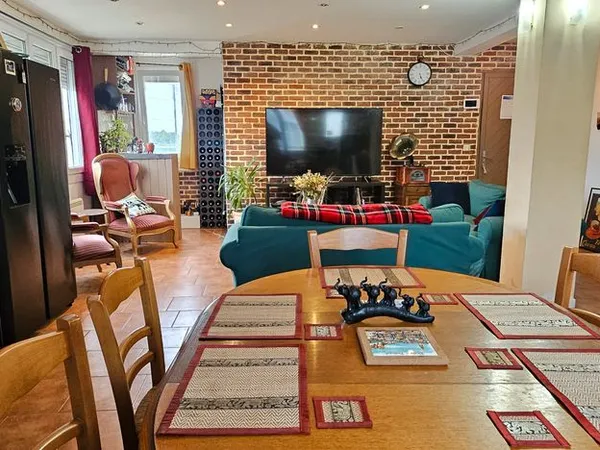 Appartement 116 m² en souplex avec jardin et stationnement