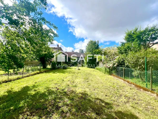 Maison à rénover de 76 m² avec garage et jardin