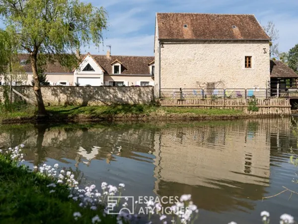 Moulin médiéval dans un cadre enchanteur