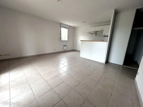 Appartement T3 en RDC avec balcon et parking