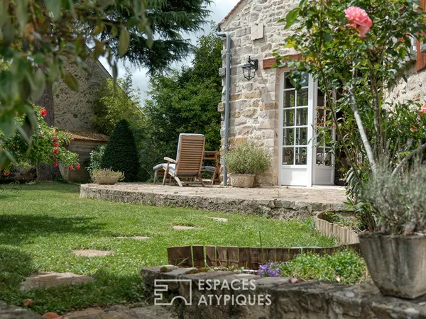 Charmante maison avec grande pièce de vie et belle hauteur sous plafond