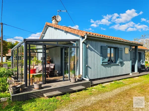 Maison T4 de plain-pied avec véranda et garage