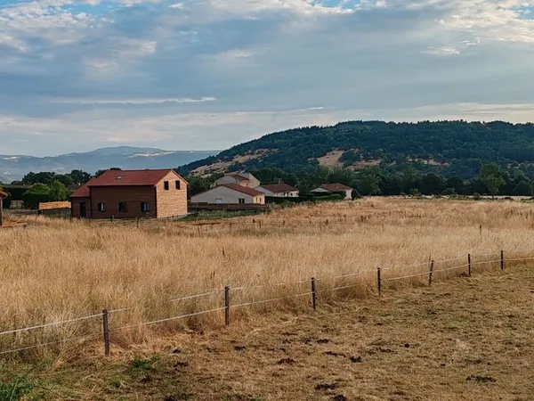 Grand terrain à bâtir pour 4 lots