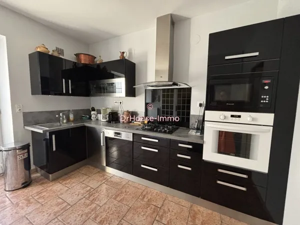 Maison rénovée de 125m² avec dépendance et jardin constructible - Centre-ville