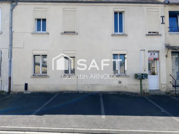 Maison avec garages et fort potentiel