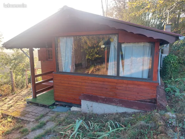 Chalet sur terrain arbore