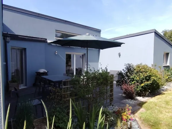Bienvenue chez vous à Beignon ! Découvrez ce magnifique plain-pied familial de 153 m² aux prestation
