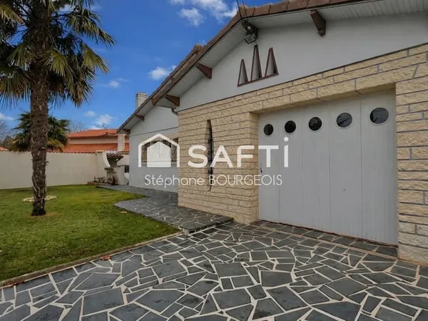 À Saujon, maison de plain-pied de 87 m2 sur parcelle de 510 m2, garage