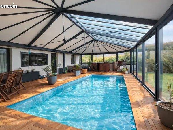 Maison familiale de 120 m² avec véranda, piscine chauffée et jardin