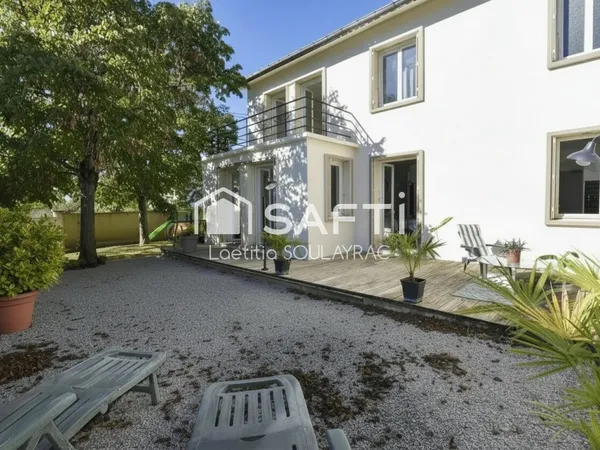 Maison proche centre 162 m² avec garage et jardin.