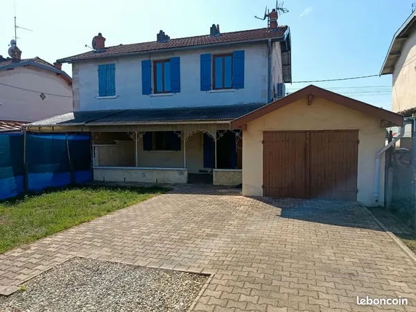 Maison avec terrain clos, garage, caves et pompe à chaleur