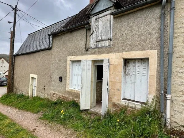 Maison de village à rénover avec grange attenante
