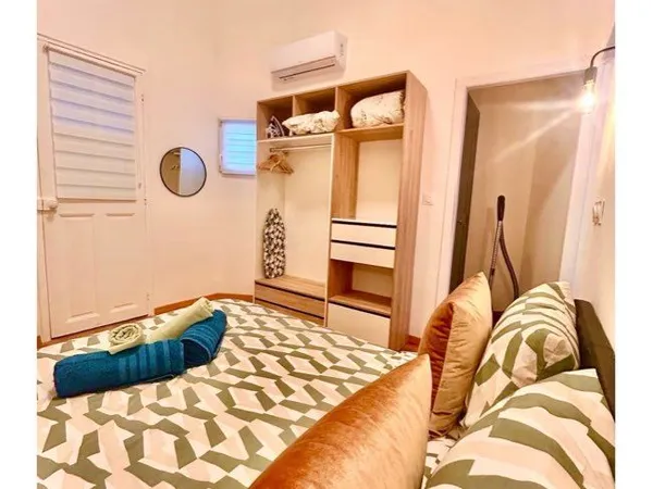 Ensemble immobilier de 3 appartements + 2 parkings - Revenus locatifs existants - Belle opportunité 