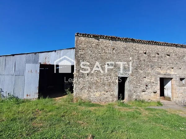Grange à rénover sur 1500 m² de terrain constructible