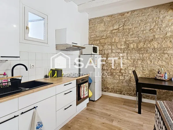 Appartement T2 immeuble de caractère