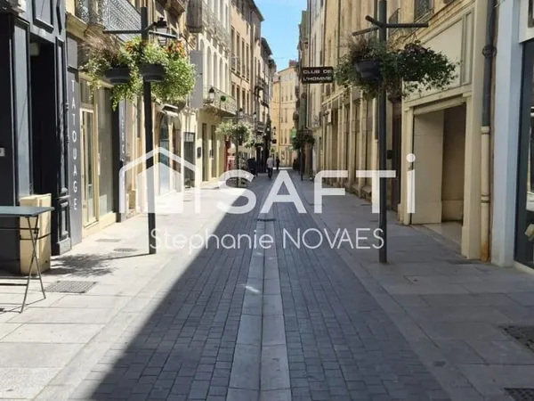 Appartement haussmannien rénové avec terrasse rare en plein coeur de Béziers.