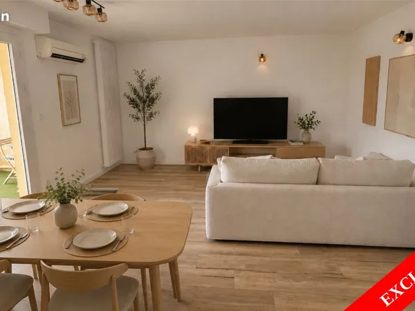 T3 75m2 traversant, terrasse couverte, stationnement privatif