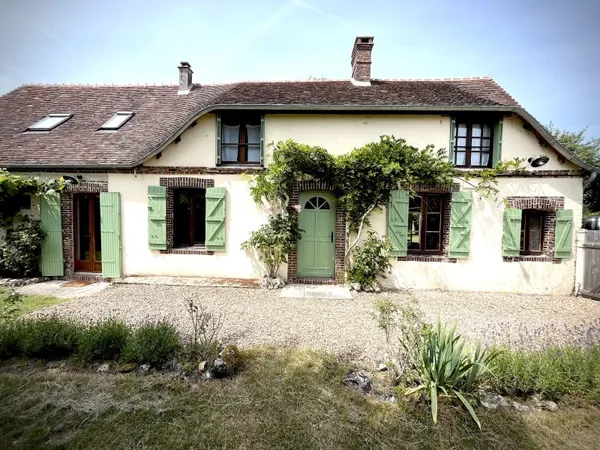 Vends maison avec jardin