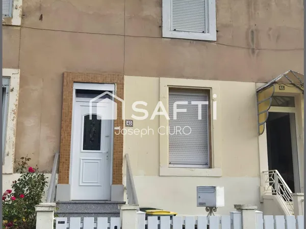 Maison mitoyenne F3,61 m²,terrain 154 m²,2 garages