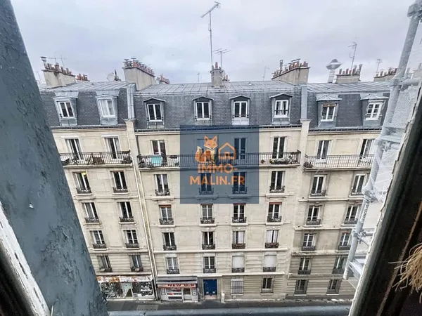 Paris 18e — Rue Marcadet — Charmant 3 pièces traversant de