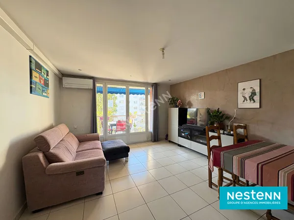 Appartement T4 de 70.07m² avec balcon, cave et stationnement situé à Villeurbanne rue Francis Presse
