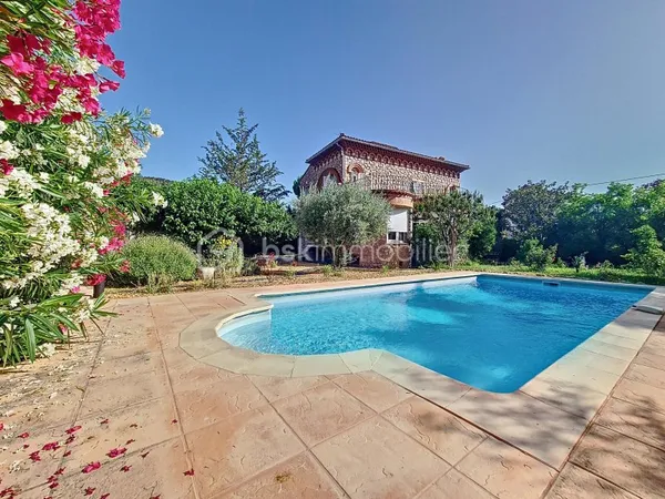 Maison 10 pièces 166 m²