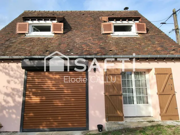 Maison avec 2 chambres, garage et cour pavée