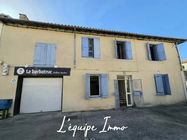 Immeuble de rapport au centre de Gimont avec local commercia