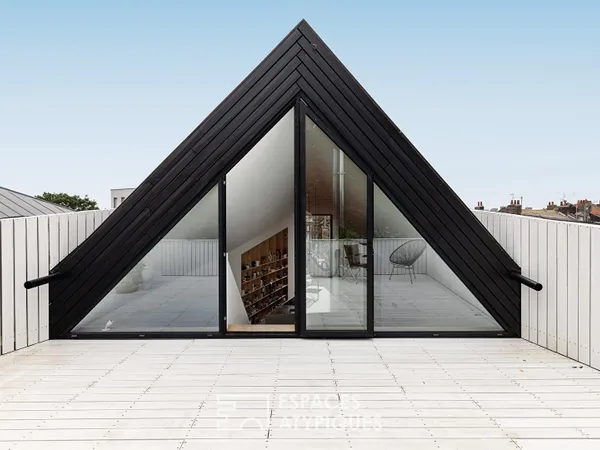 Maison Berton, prouesse architecturale brute et lumineuse avec toit-terrasse