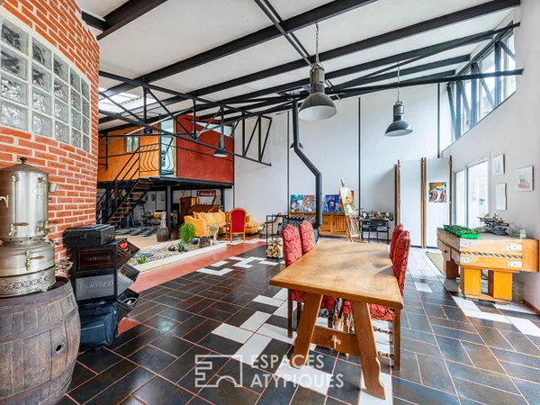 Loft unique au coeur du village de Montigny. Expression pure, volume et lumière !