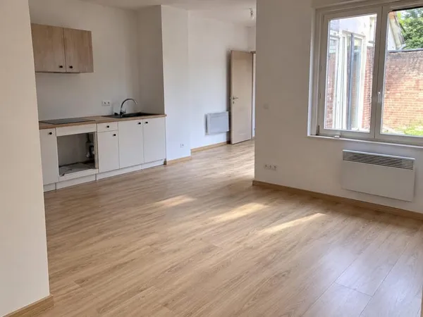 IMMEUBLE COMPOSE DE 3 LOGEMENTS;