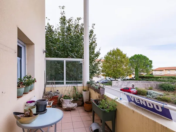 Appartement type 4 avec véranda, balcons, garage et parking,