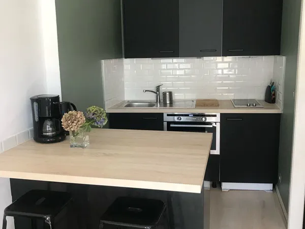 T2 duplex quartier mairie avec terrasse